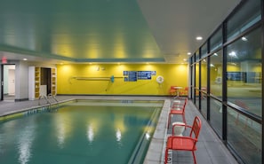 Indoor pool, open 9:00 AM to 9:00 PM, pool loungers