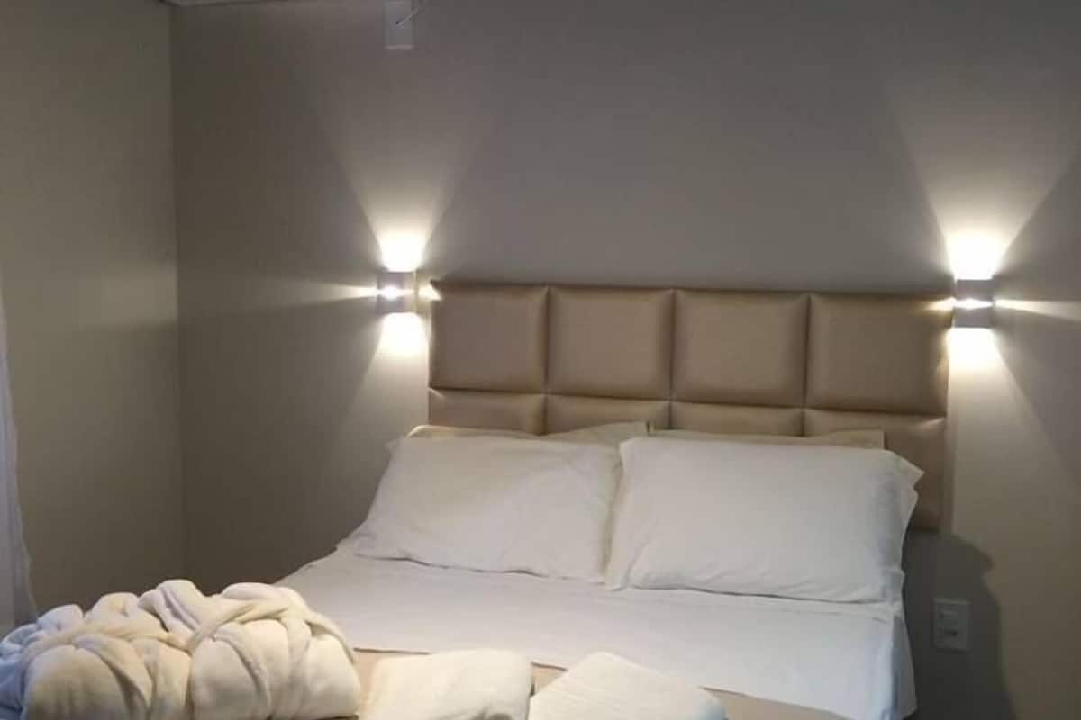 Double Room | Minibar, blackout drapes, iron/ironing board, free WiFi