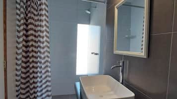 Economy Double Room | Bathroom | Shower, hair dryer, towels, soap