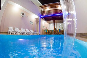 Outdoor pool, open 10:00 AM to 10:00 PM, pool umbrellas, sun loungers