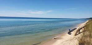 On the beach, sun-loungers