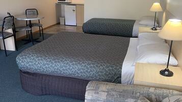 Twin Room | Premium bedding, desk, laptop workspace, iron/ironing board