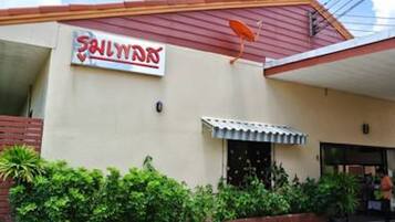 A building with a sign that reads "Sailor's".