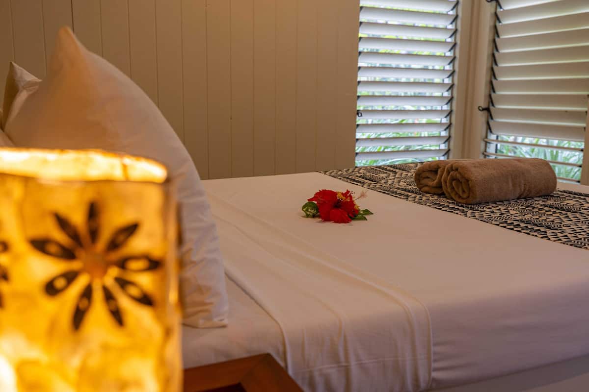 frangipani room | 1 bedroom, bed sheets