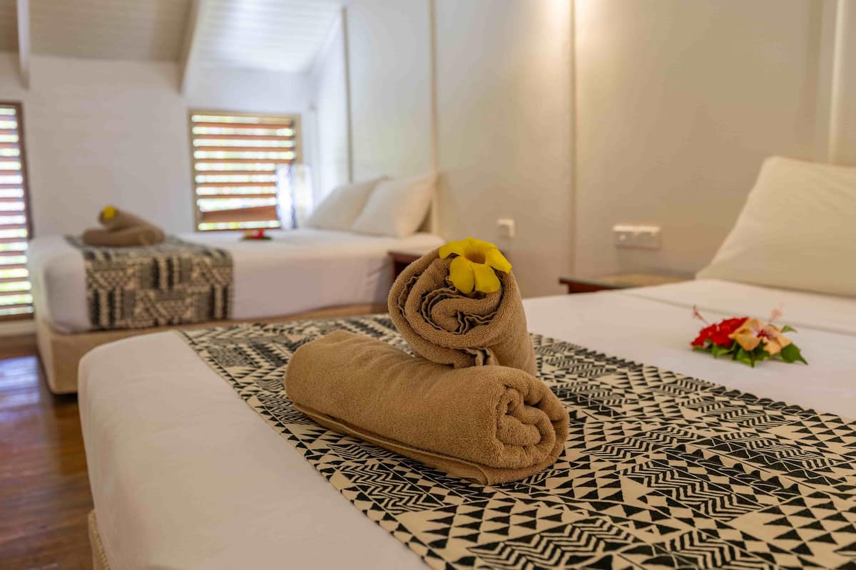 family room | 1 bedroom, bed sheets