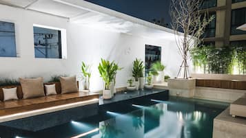 Outdoor pool, pool umbrellas, pool loungers