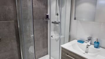 Shower, free toiletries, hair dryer, towels