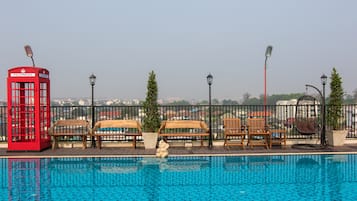 Outdoor pool, sun loungers