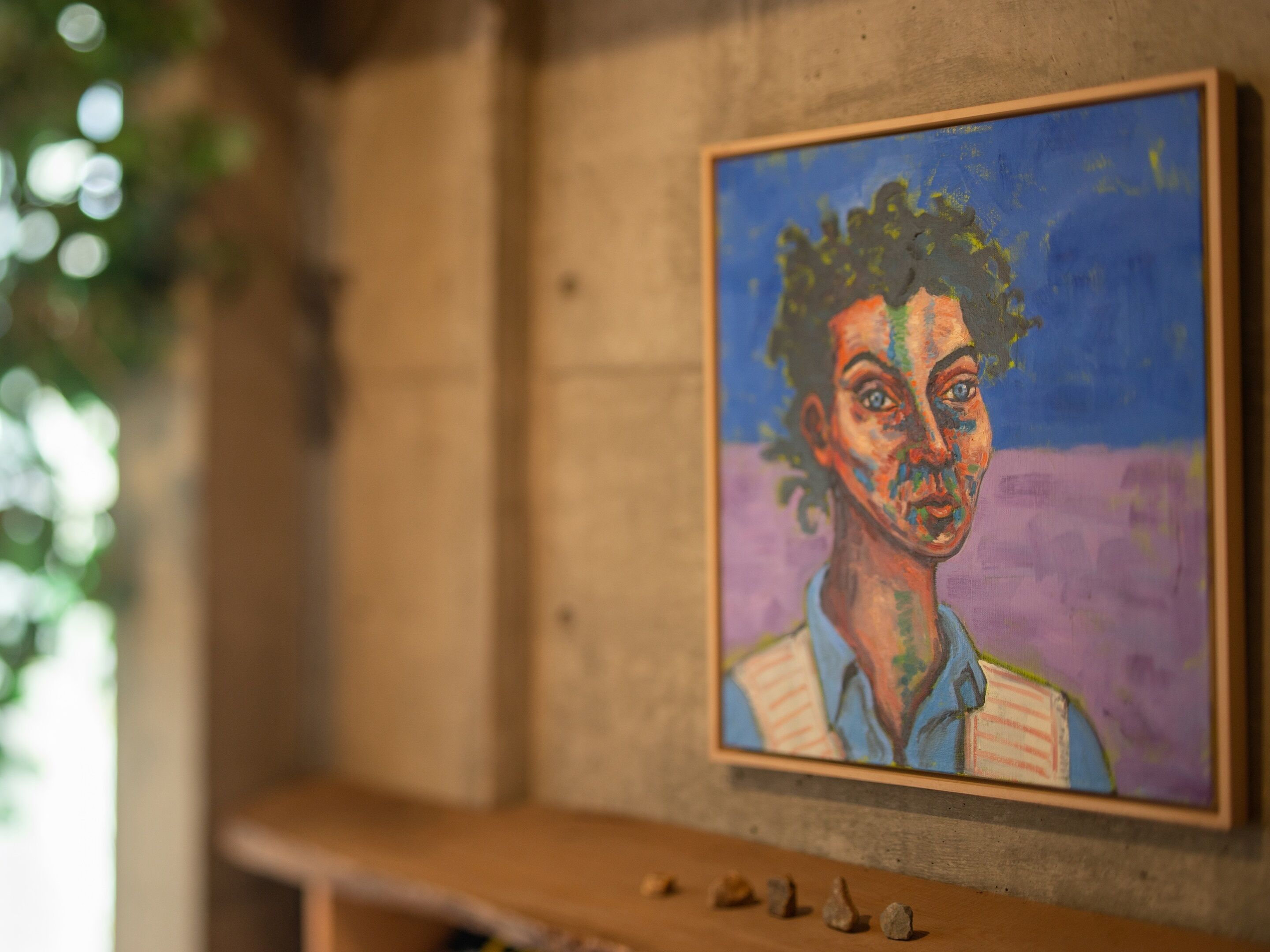 A painting on a wooden wall.