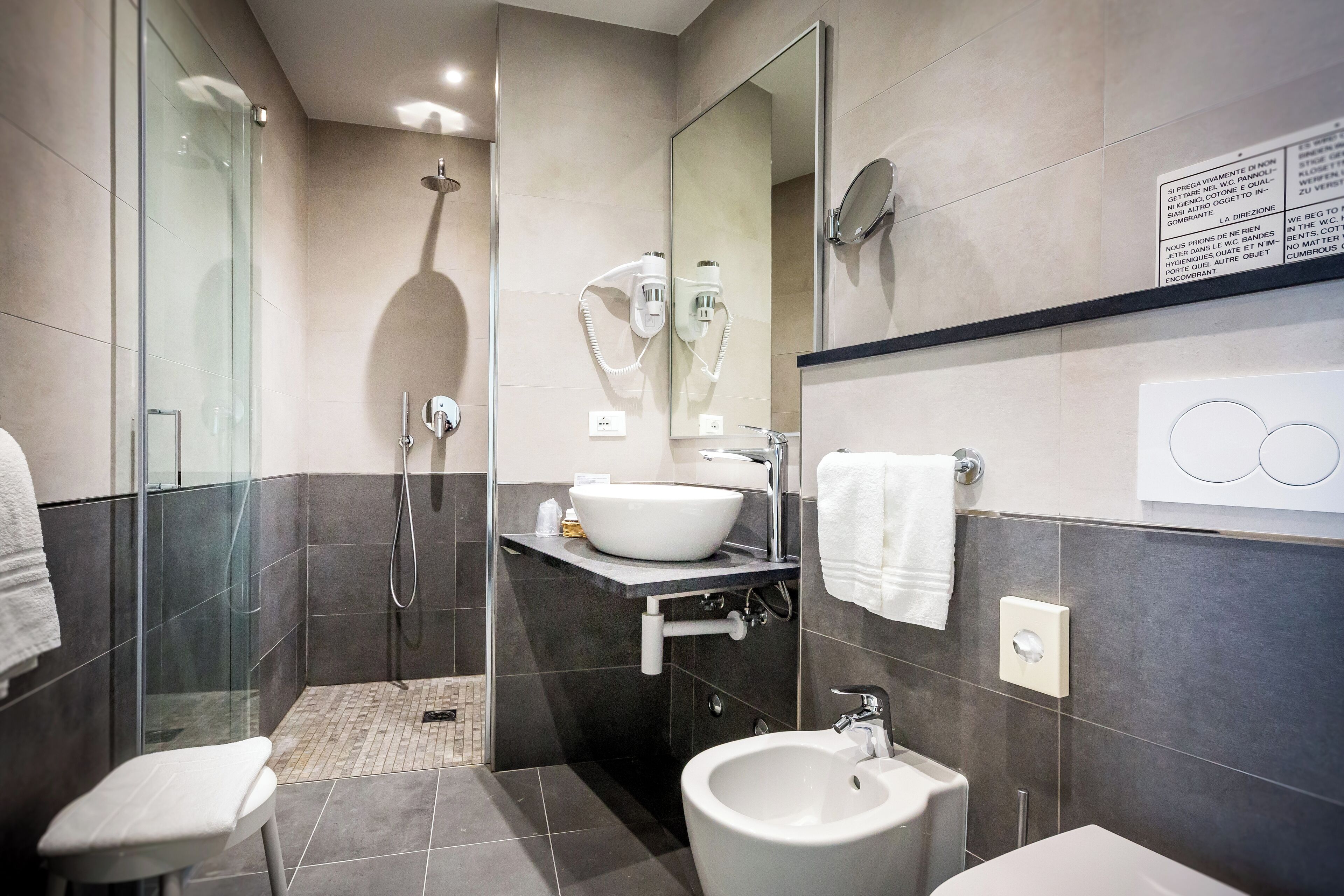 junior suite | bathroom | free toiletries, hair dryer, slippers, bidet