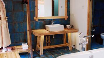 Shower, free toiletries, hair dryer, slippers