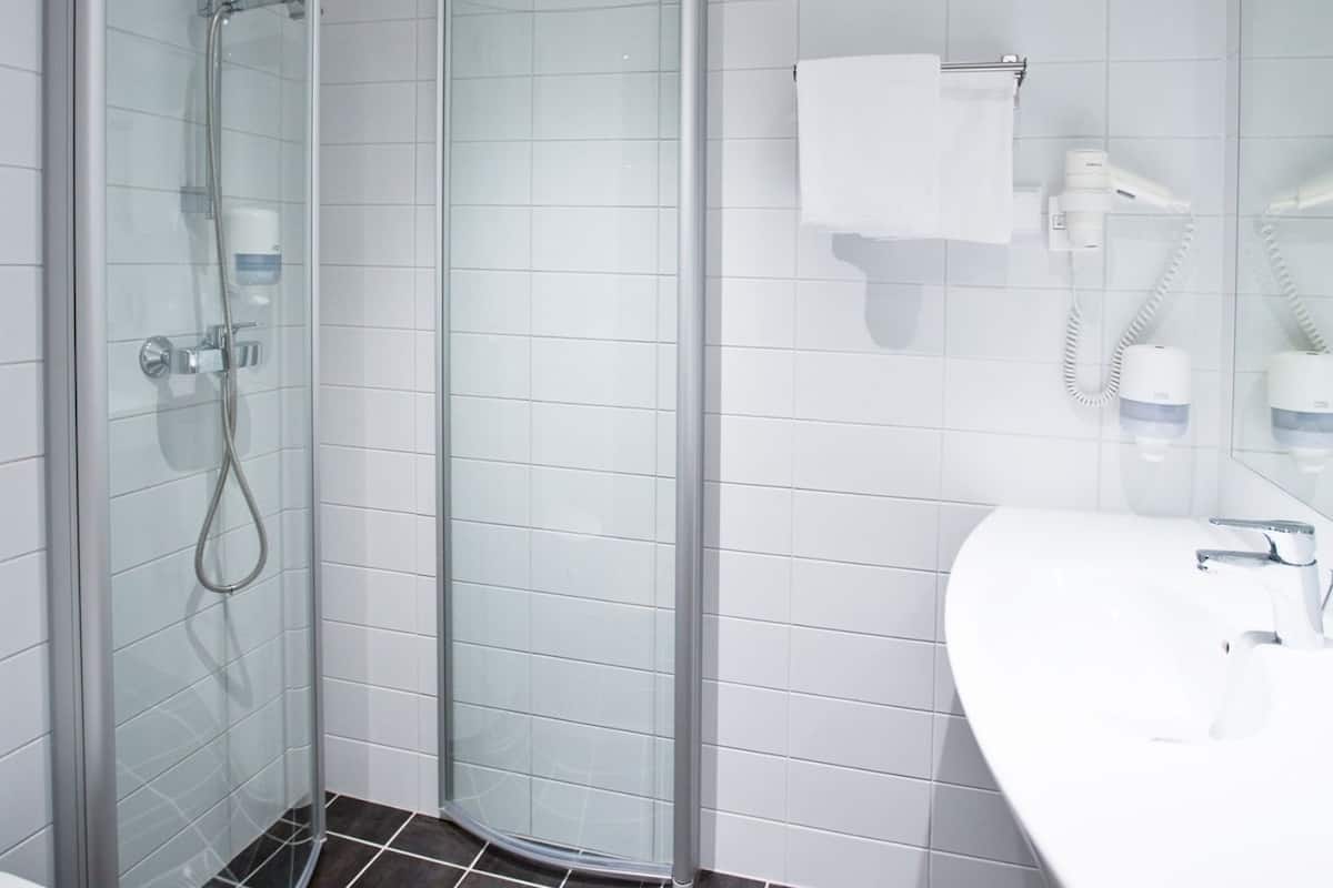 shower, free toiletries, hair dryer, heated floors