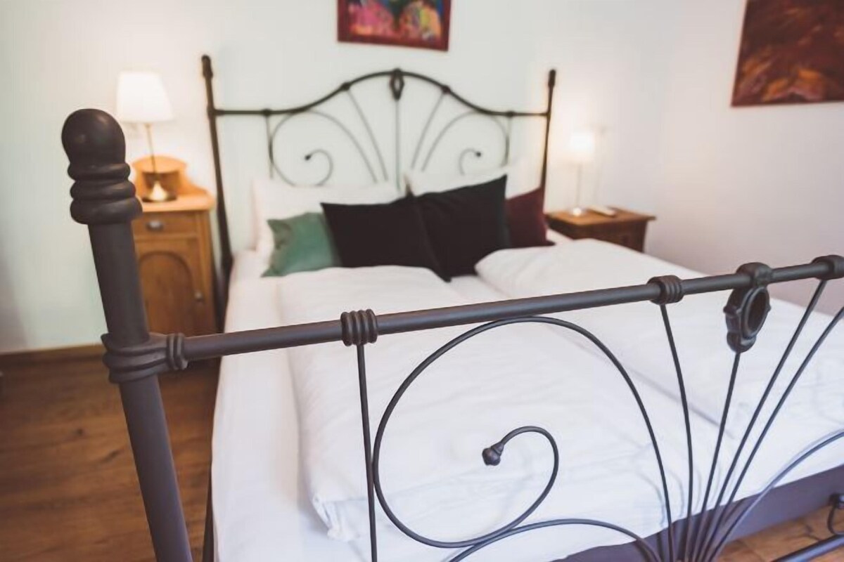 1 dormitorio y ropa de cama de alta calidad