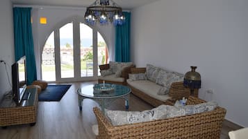 Chalet, Kitchen, Sea View | Living area | 46-inch flat-screen TV with cable channels, TV, ping pong