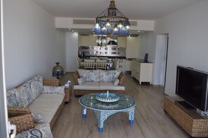 Chalet, Kitchen, Sea View | Living area | 46-inch flat-screen TV with cable channels, TV, table tennis