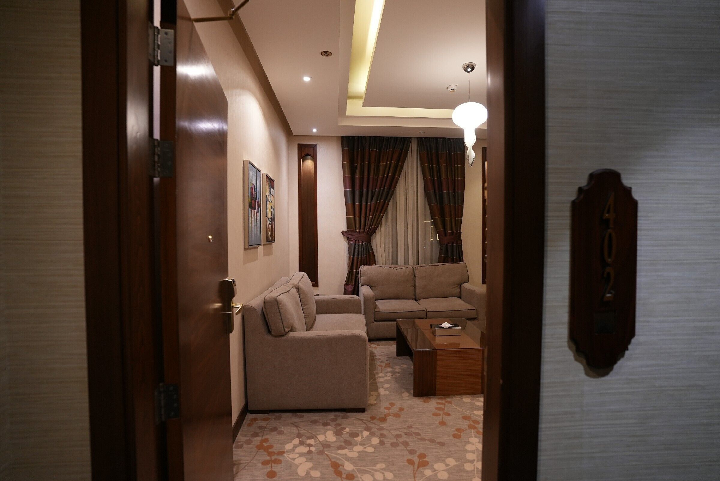 executive suite, 2 bedrooms (amiri) | living area | 48-inch led tv with satellite channels, tv