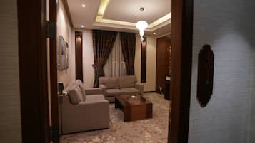 Executive Suite, 2 Bedrooms (Amiri) | Living area | 48-inch LED TV with satellite channels, TV