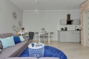 Appartement | Salle de séjour | Télévision à écran plat de 40 pouces avec chaînes par câble, télévision