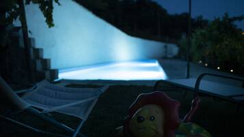 Seasonal outdoor pool, open 9:30 AM to 7:30 PM, pool umbrellas