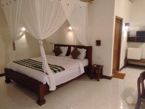 Deluxe Double Room, 1 King Bed, Patio, Garden Area | In-room safe, individually furnished, laptop workspace, free WiFi