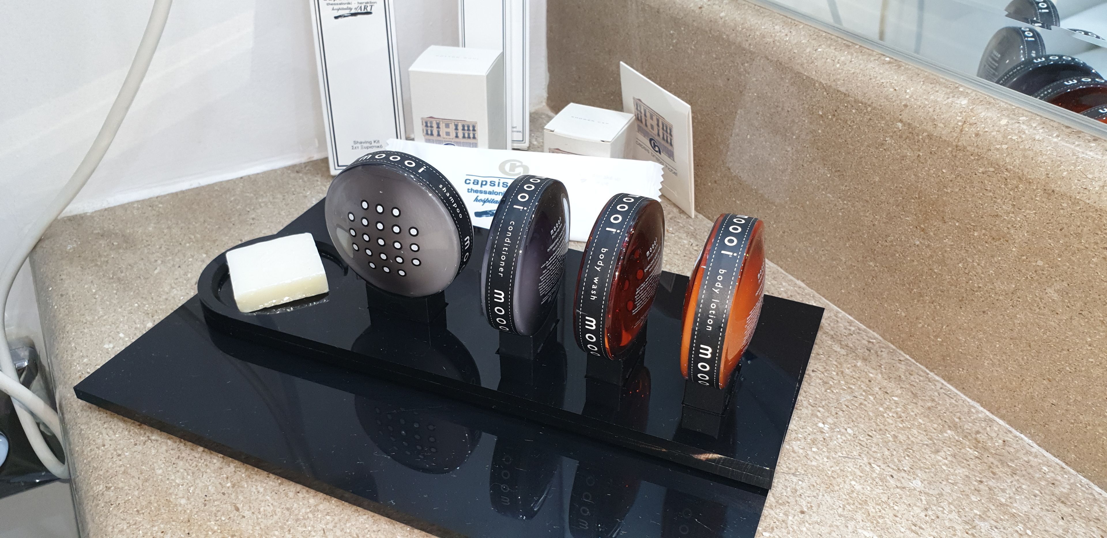 deep-soaking bathtub, designer toiletries, hair dryer, bathrobes