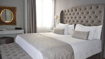 Ropa de cama de alta calidad, colchones con pillow-top y minibar