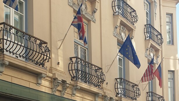 A historic building with ornate balconies, flags, and a classic facade. - Capsis Bristol Boutique Hotel (Thessaloniki)
