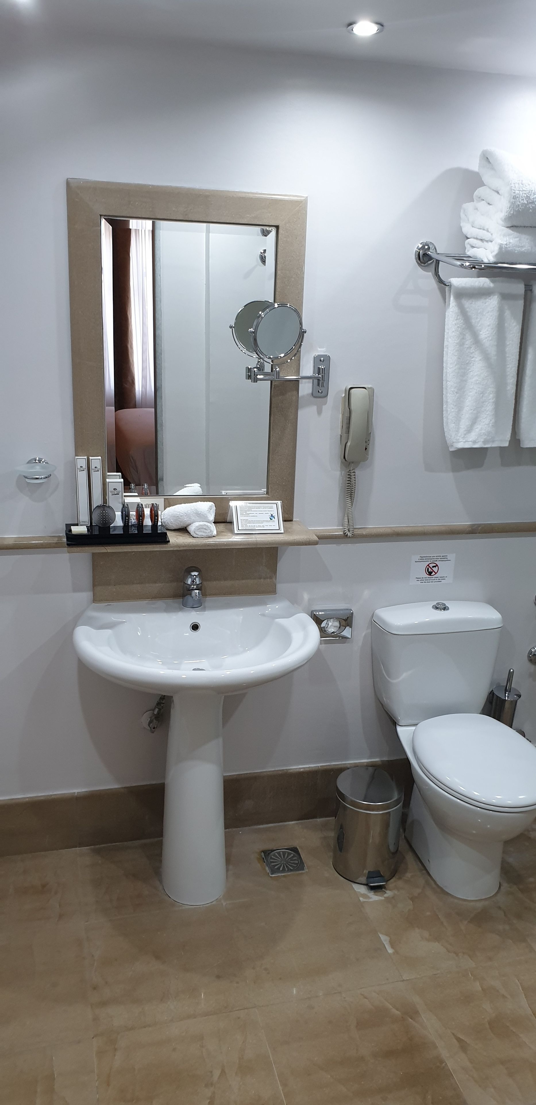 deep-soaking bathtub, designer toiletries, hair dryer, bathrobes