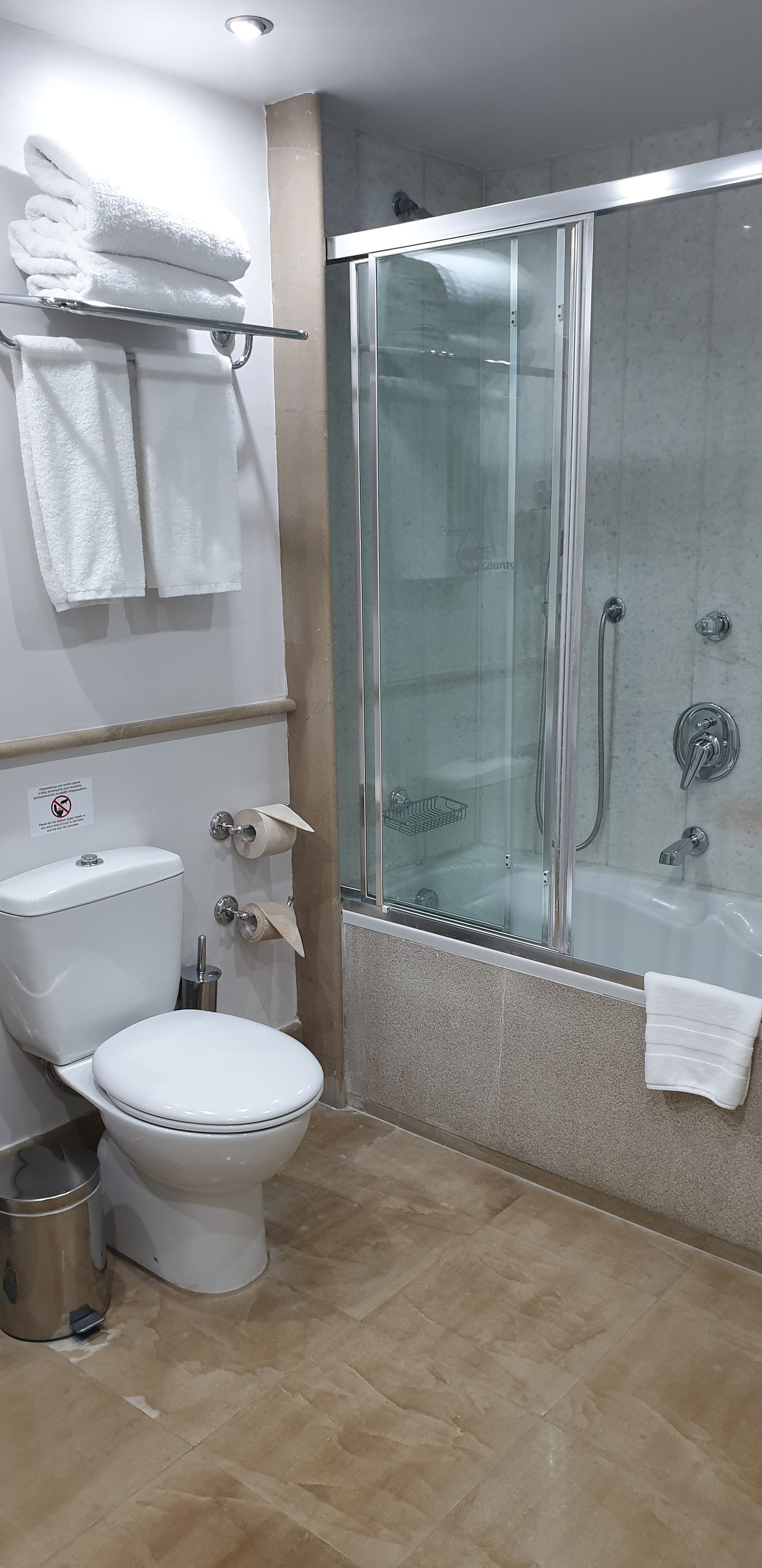 deep-soaking bathtub, designer toiletries, hair dryer, bathrobes