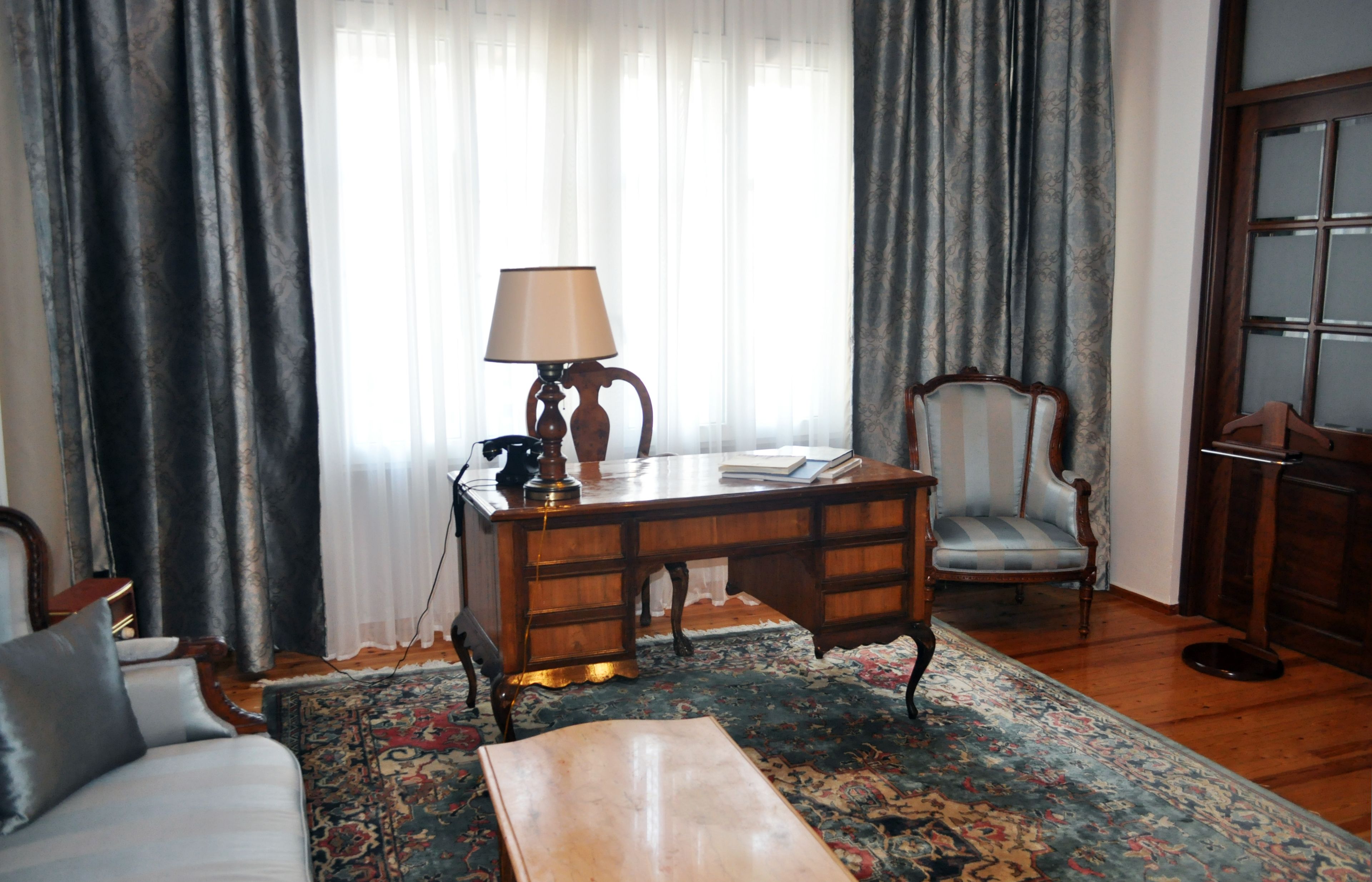 superior suite (bristol suite) | living room | 32-inch lcd tv with satellite channels, tv