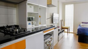 Exclusive Apartment, Mountain View | Private kitchen - FrescoBett at Margonda Residence Depok (Depok)
