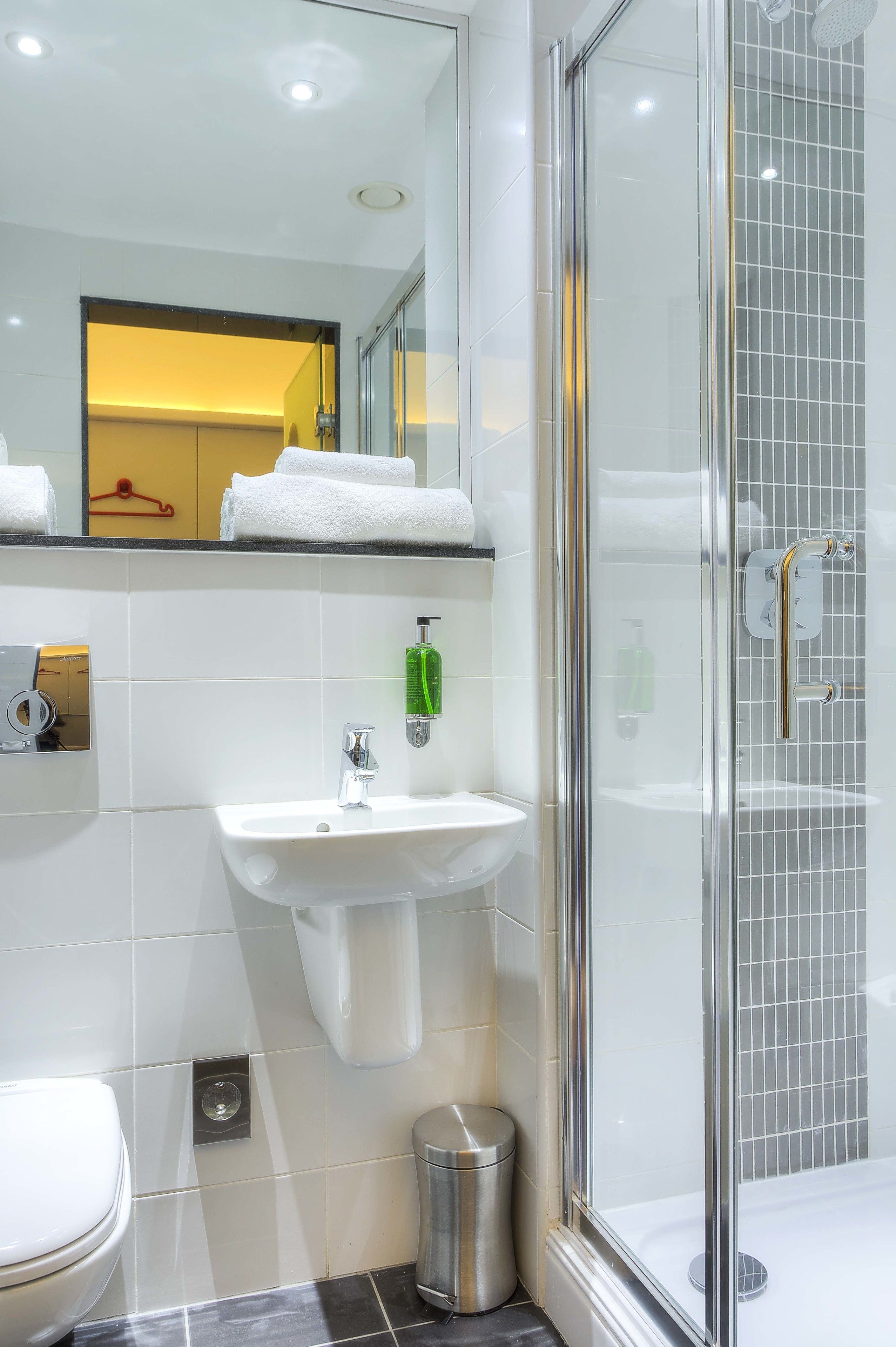 shower, eco-friendly toiletries, hair dryer, towels