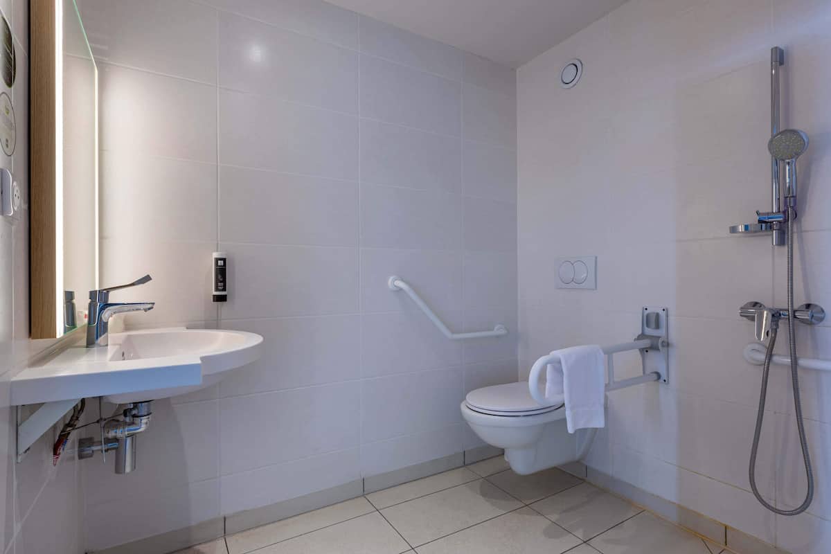 double room, accessible, non smoking | bathroom | shower, hair dryer, towels, soap