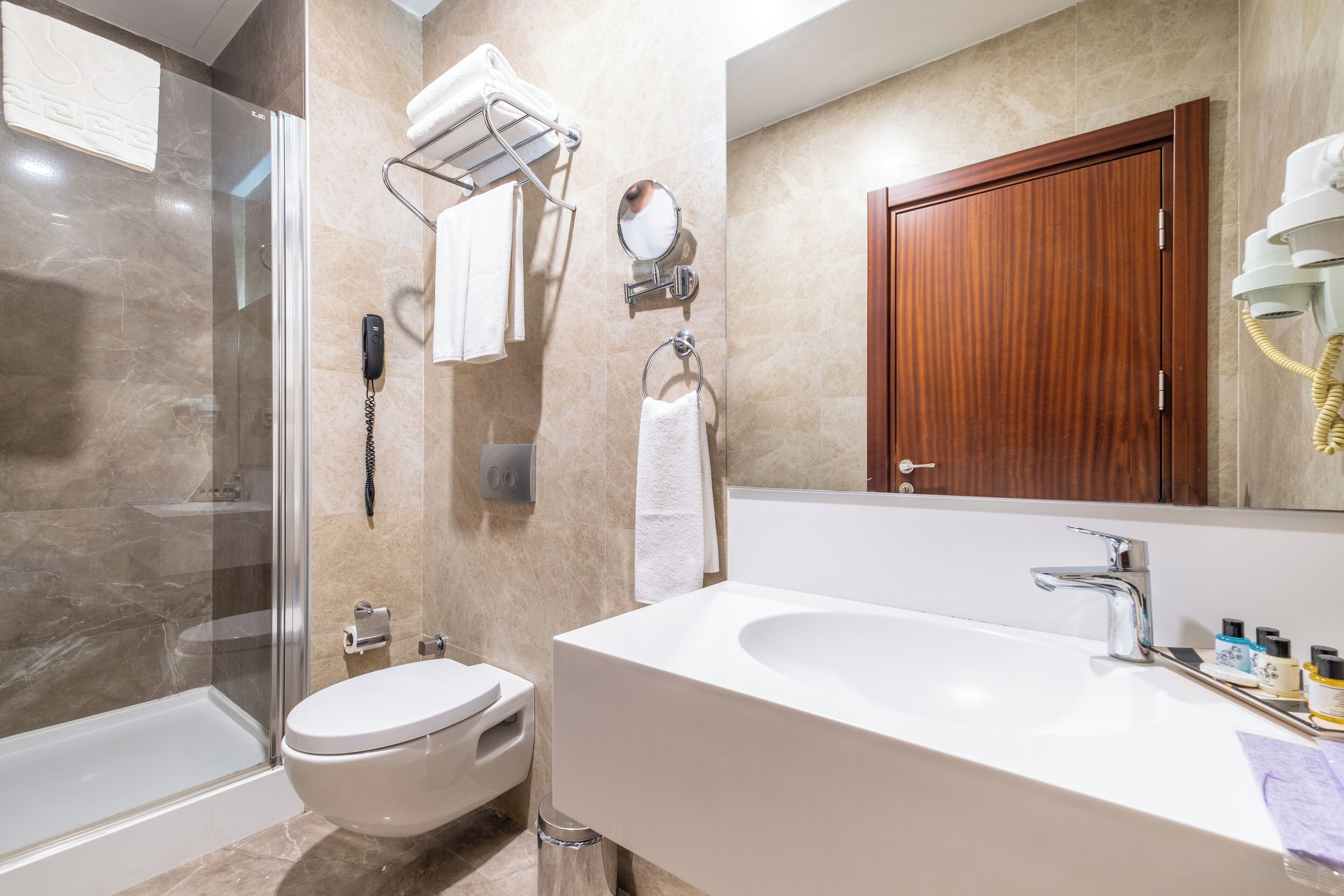 economy double room | bathroom | shower, free toiletries, hair dryer, slippers