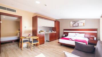 Family Room | Premium bedding, in-room safe, soundproofing, iron/ironing board