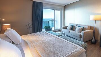 Privilege, Premium Room, Sea View | Minibar, in-room safe, desk, blackout drapes