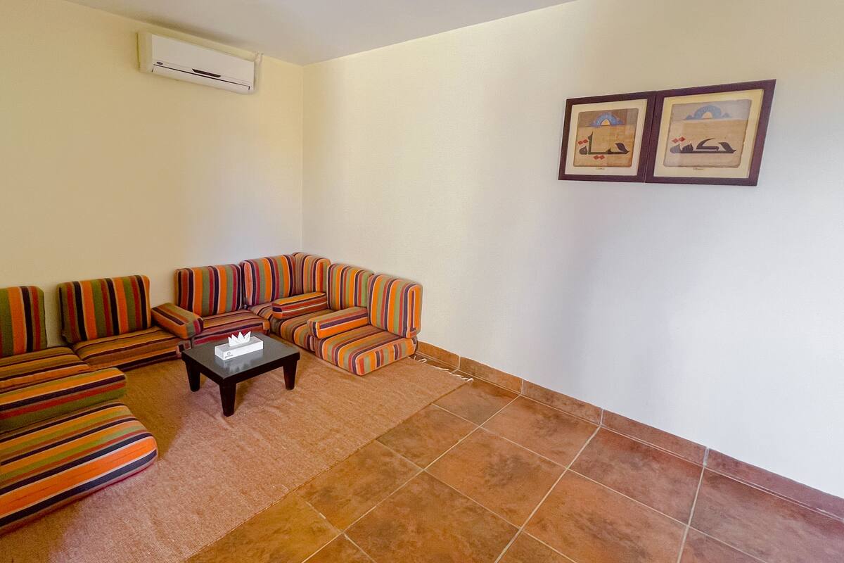 junior room | living area | flat-screen tv