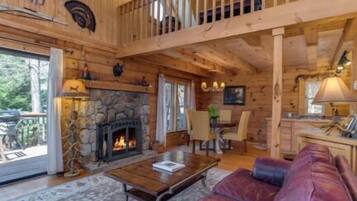 Comfort Cabin, 3 Bedrooms, Fireplace | Living area | 32-inch flat-screen TV with cable channels, TV, fireplace