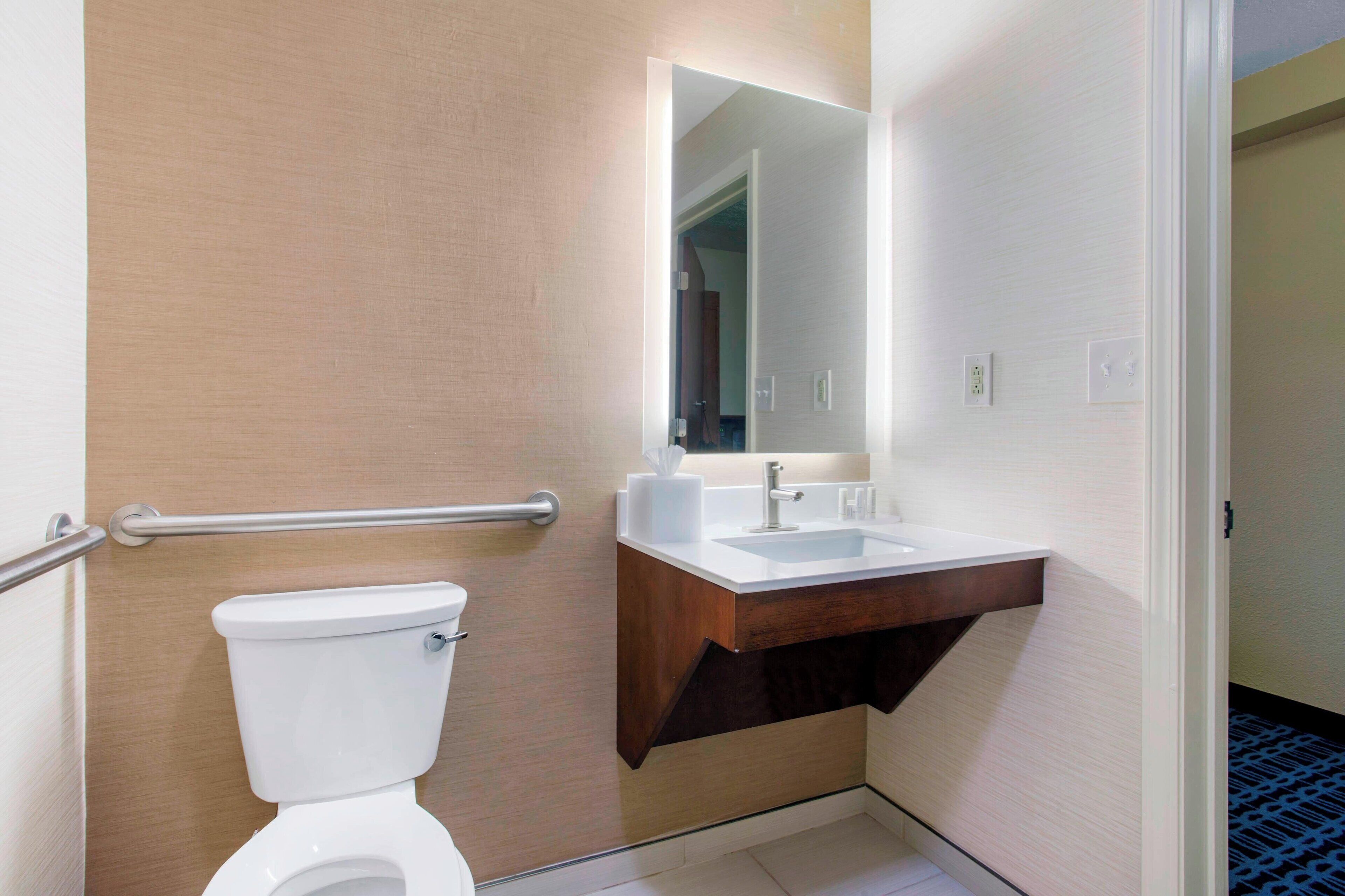 suite, multiple beds | bathroom | hydromassage showerhead, hair dryer, towels, toilet paper
