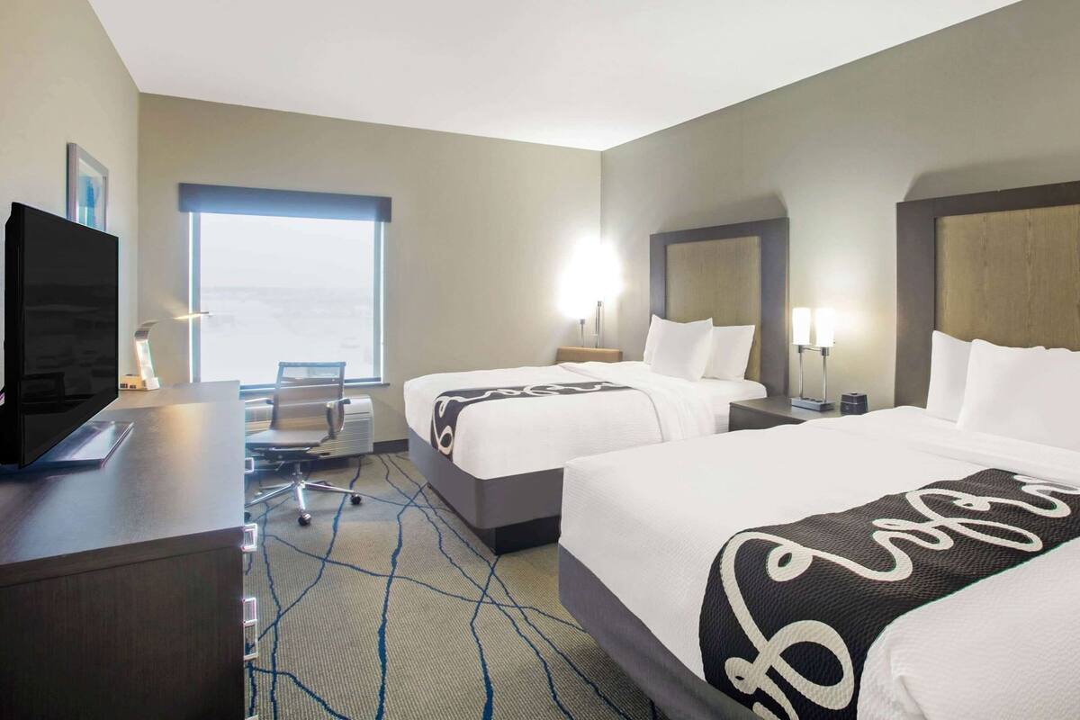 Premium bedding, down comforters, in-room safe, desk