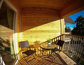 Suite superior, 1 cama King size, balcón, vista a la bahía | Balcón