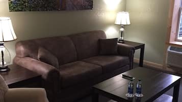 Suite, 1 King Bed with Sofa bed (Room 7) | Living room | Flat-screen TV