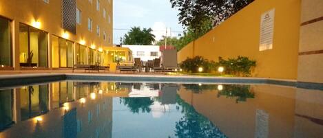Outdoor pool, open 8:00 AM to 7:30 PM, sun loungers