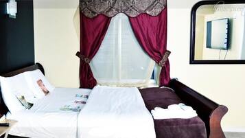 7 bedrooms, premium bedding, minibar, desk