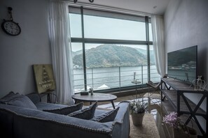 Standard-Loft, Nichtraucher, Flussblick (SS IV) | Wohnbereich | Flachbildfernseher, Pay-TV