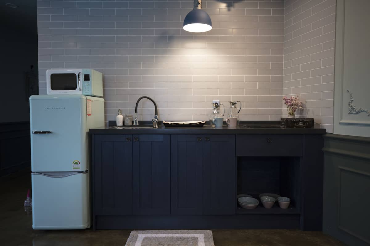 presidential room, multiple beds, non smoking, river view (ss x) | private kitchen | electric kettle