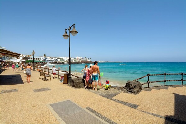 On the beach, sun loungers, beach towels - Sounds of  the Sea Apartment Playa Blanca  Lanzarote 2 minutes walk to the beach (Playa Blanca, Yaiza)