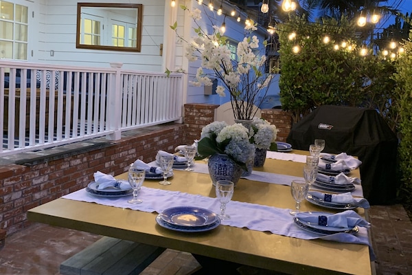 Dine under twinkly lights.