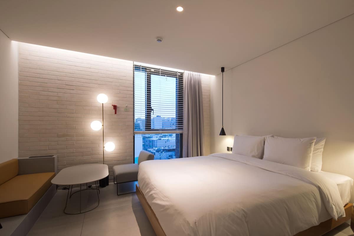 Premium bedding, down duvets, memory-foam beds, in-room safe