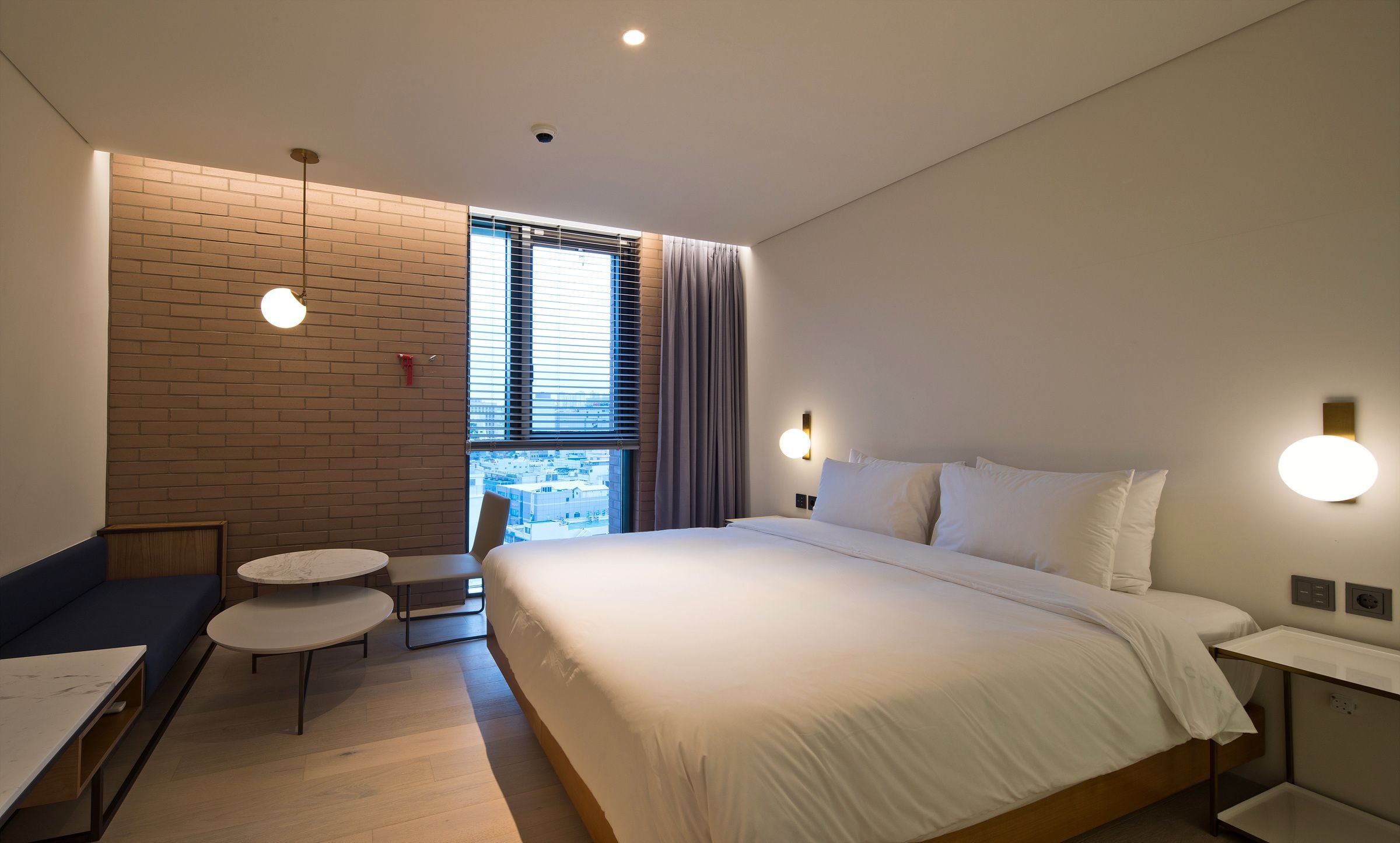 premium bedding, down duvets, memory-foam beds, in-room safe